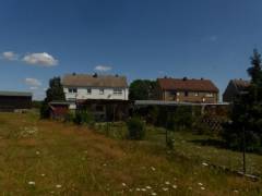 Vorschau Objekt: Rückansicht Haus und Gartenteil 